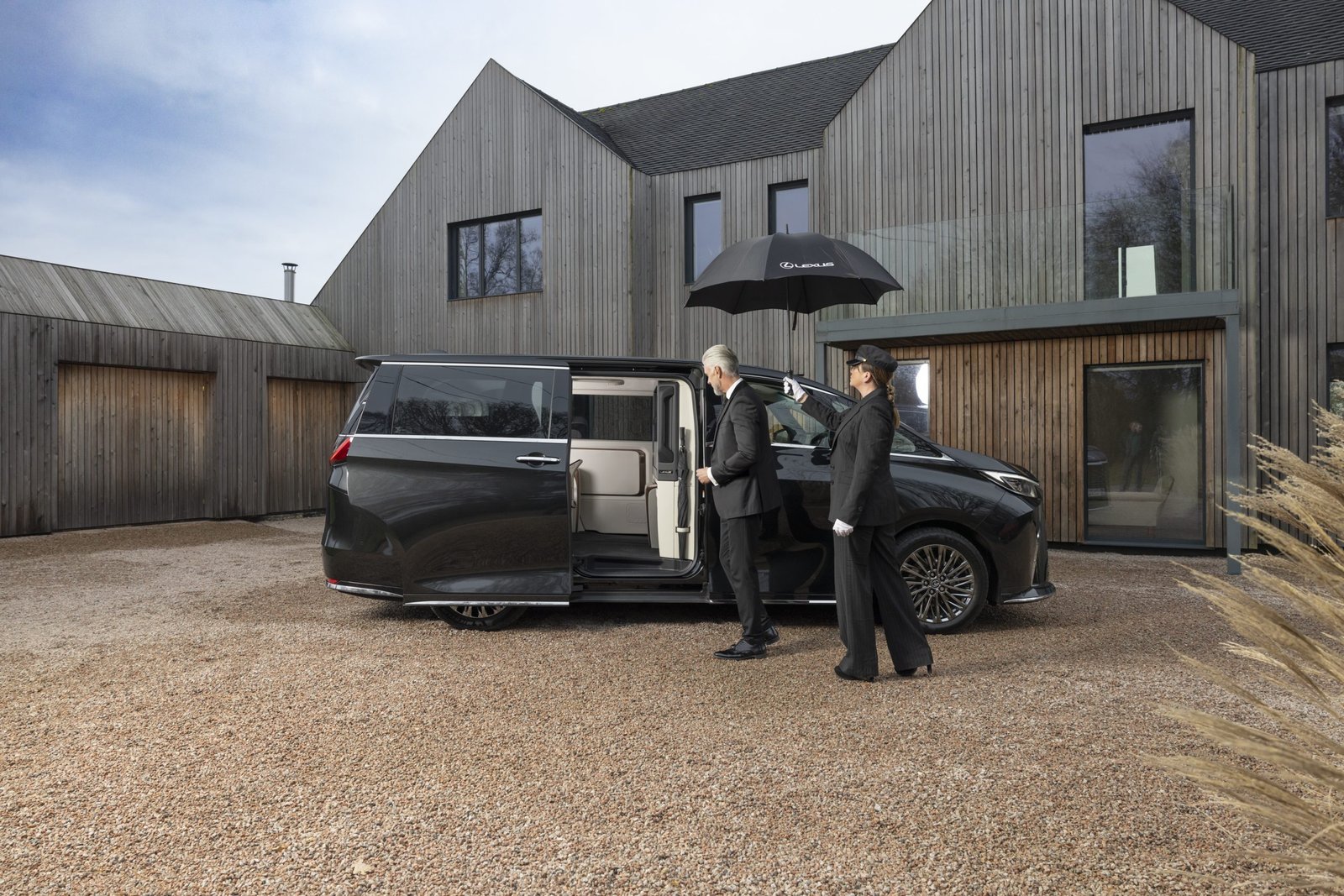 Lexus LM 500h door open ready for passenger